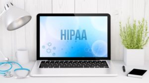 HIPPA Acronym on Laptop